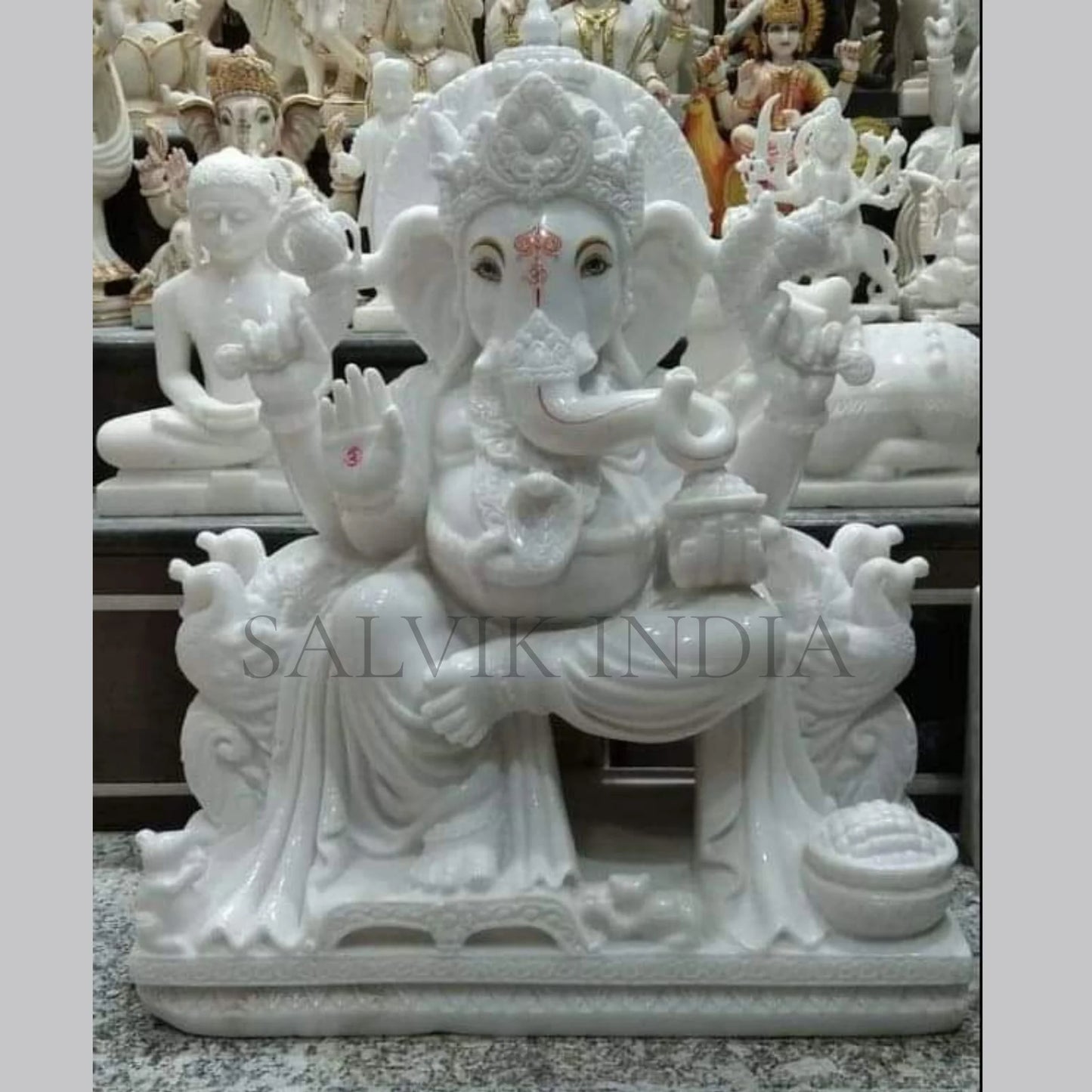 Lord Ganesh Marble Statue – Handcrafted White Marble Ganpati Idol for Home & Temple