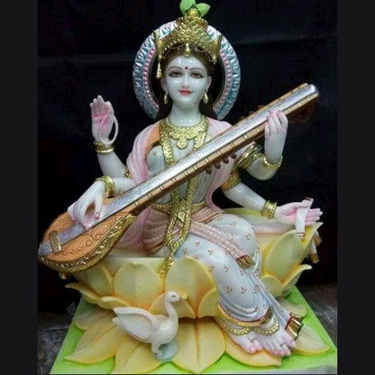 Buy Painted Marble Saraswati Idol Sitting on Lotus