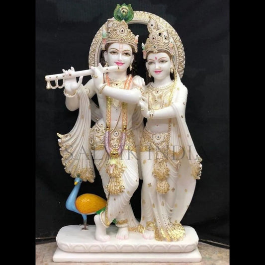 Handcrafted Radha Krishna marble idol in white marble.