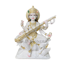 Handcrafted white marble Saraswati idol with detailed carving