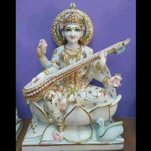 Veena Vadini Saraswati marble idol seated on a lotus base