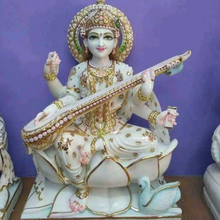 Veena Vadini Saraswati marble idol seated on a lotus base