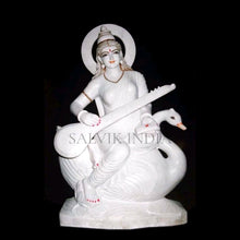 Goddess Saraswati marble statue seated on swan with Veena