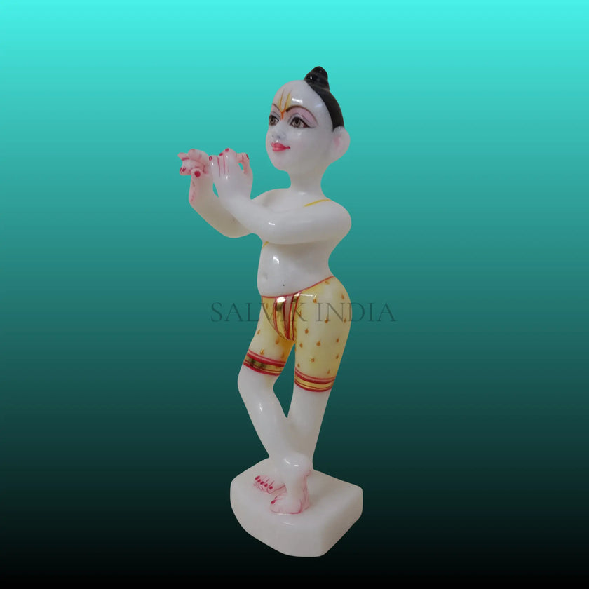 Side view of Bal Gopal Kanha Ji marble murti with fine hand carving
