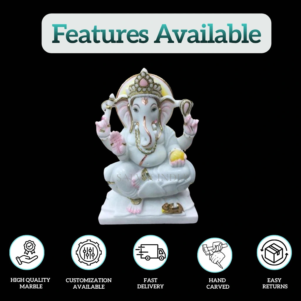 Front view of designer marble Ganpati statue with decorative ornaments