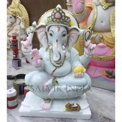 Designer marble Ganpati idol with intricate traditional carving