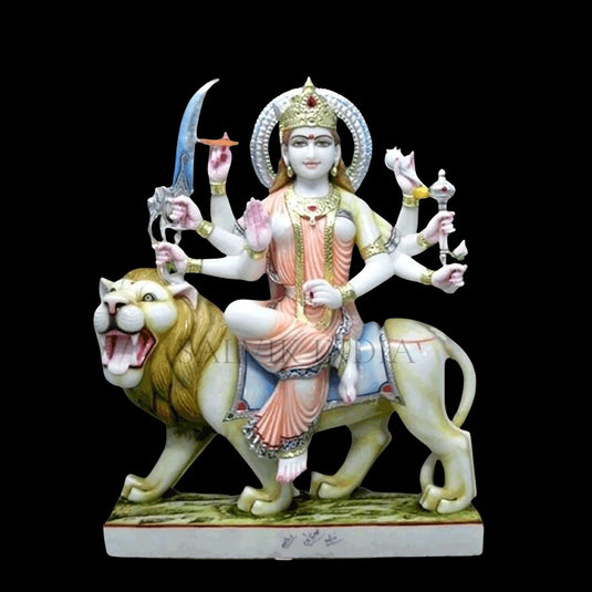 Front view of Durga marble idol with calm divine expression