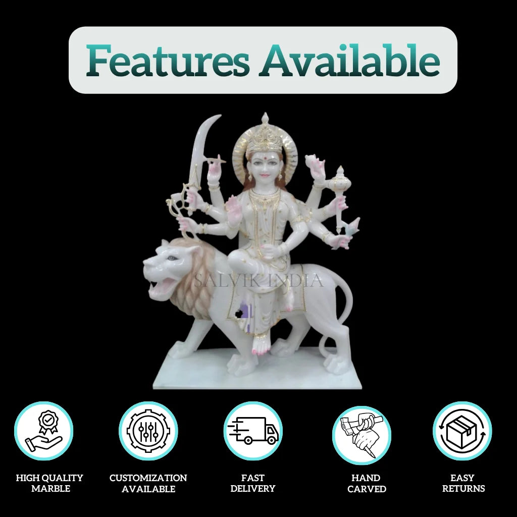 Front view of Durga marble statue seated on lion with divine expression