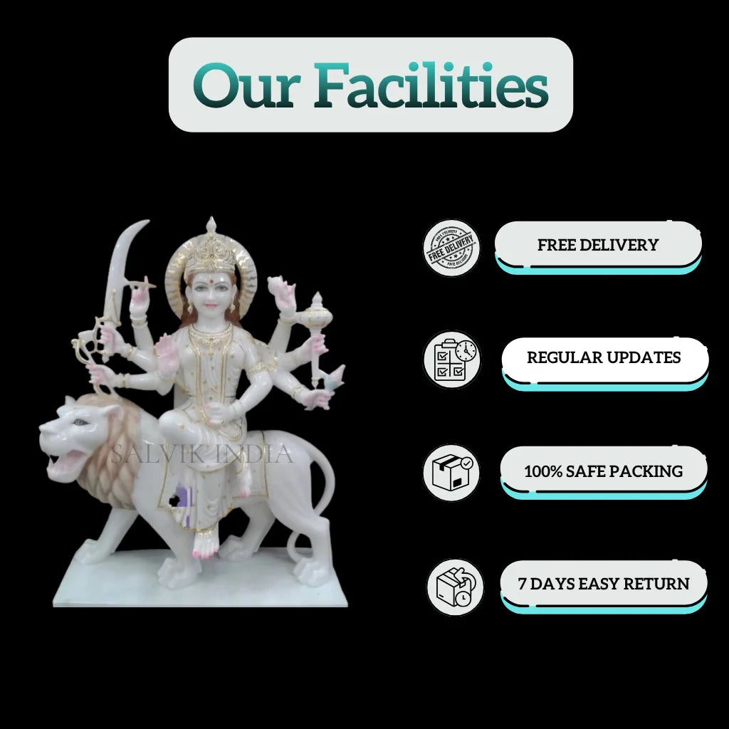 Side view of Durga marble statue in lion seated pose handcrafted idol