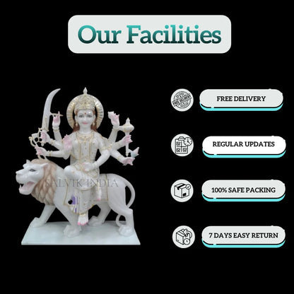 Side view of Durga marble statue in lion seated pose handcrafted idol