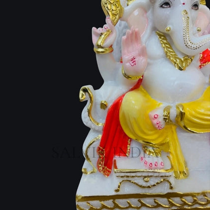 close up of Ganesh idol showing fine carving and facial detailing