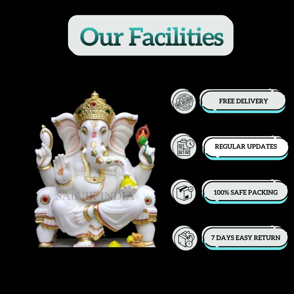 White Ganesh Ji Marble Statue with detailed craftsmanship