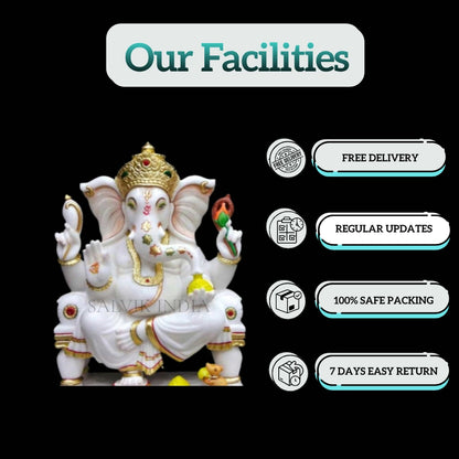 White Ganesh Ji Marble Statue with detailed craftsmanship