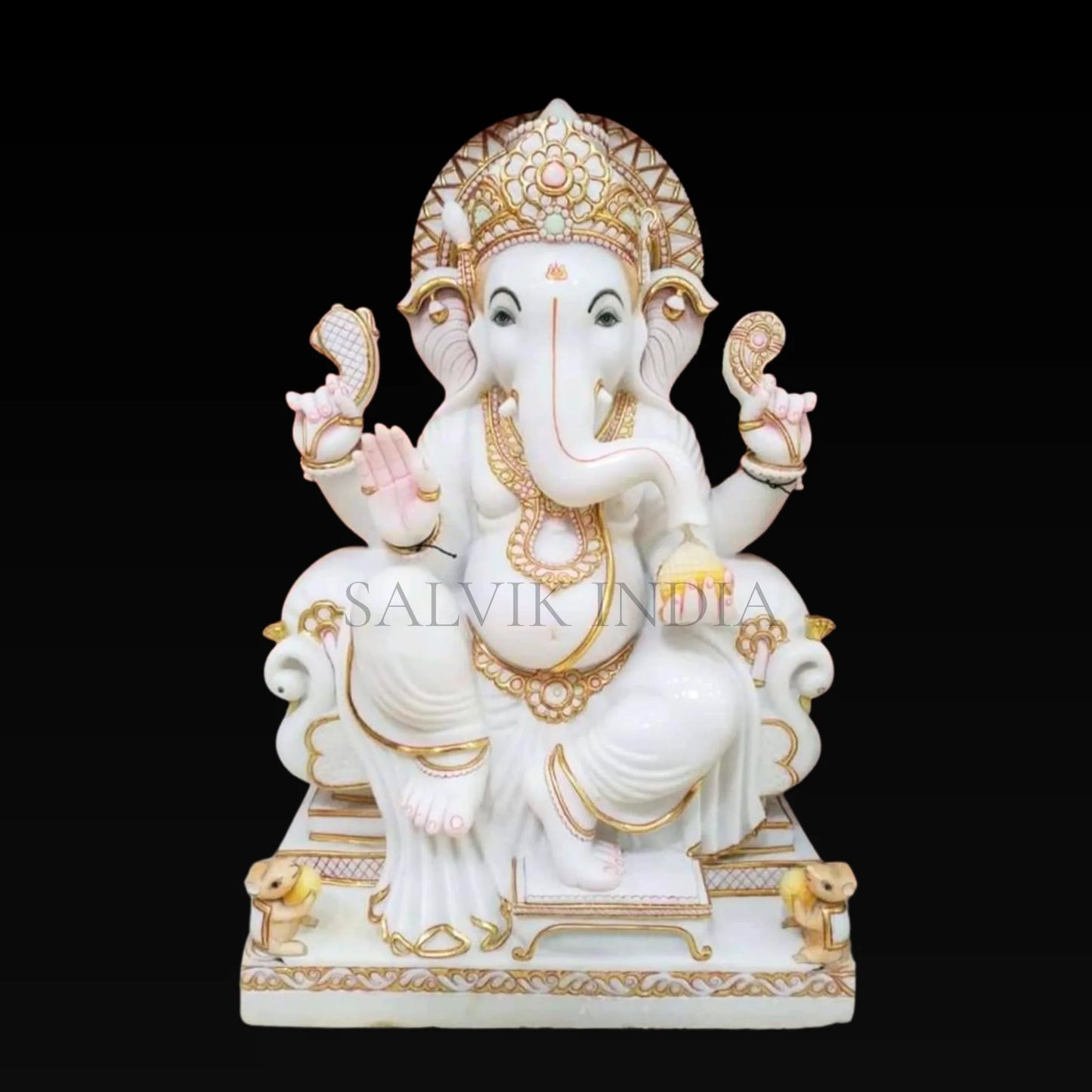 Handcrafted Ganesh sculpture in Makrana marble with traditional veena design
