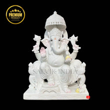 Side view of hand carved Ganpati Marble Statue showcasing intricate craftsmanship in white Makrana marble
