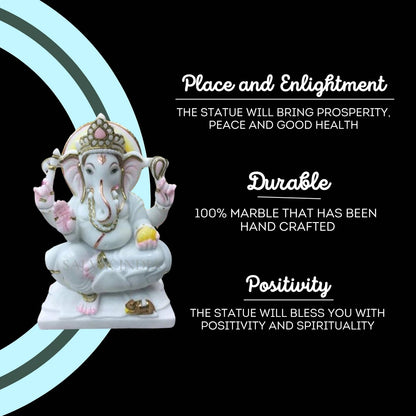 Designer marble Ganpati idol featuring decorative gold accents