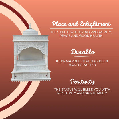 Hand carved marble mandir pillar detail showing intricate dome and arch design