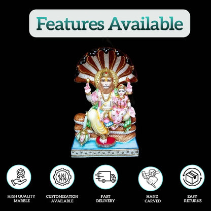 Laxmi Narayan marble idol beneath a multi-headed Sheshnaag canopy