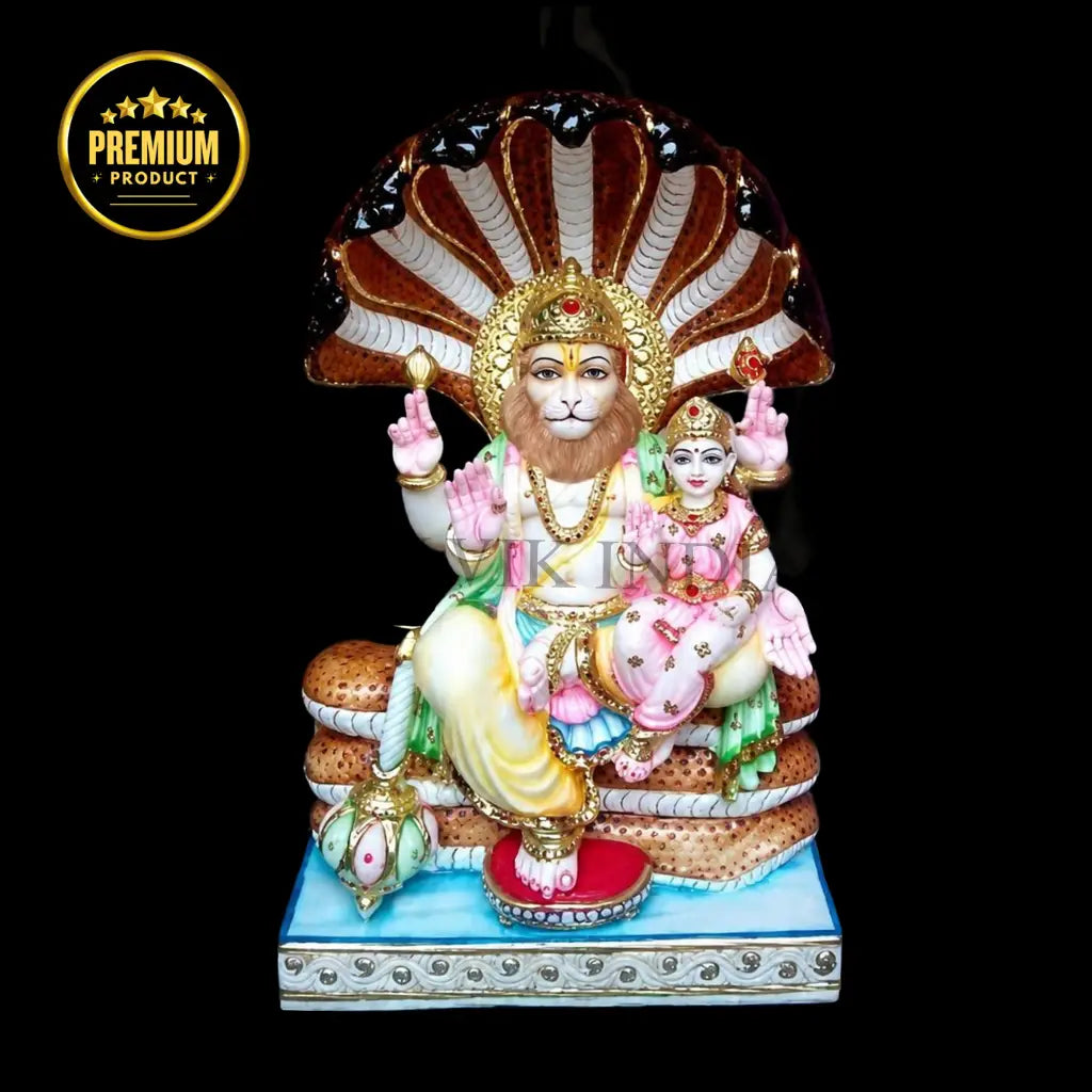 Front view of handcrafted Laxmi Narayan marble statue with traditional detailing
