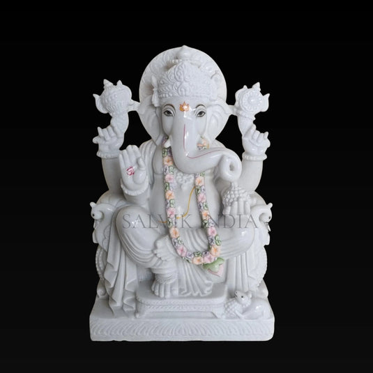 Handcrafted Makrana marble Ganesh statue with detailed carving and seated posture