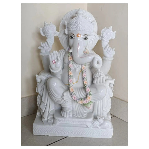 Handcrafted Makrana marble Ganesh statue with detailed carving and seated posture