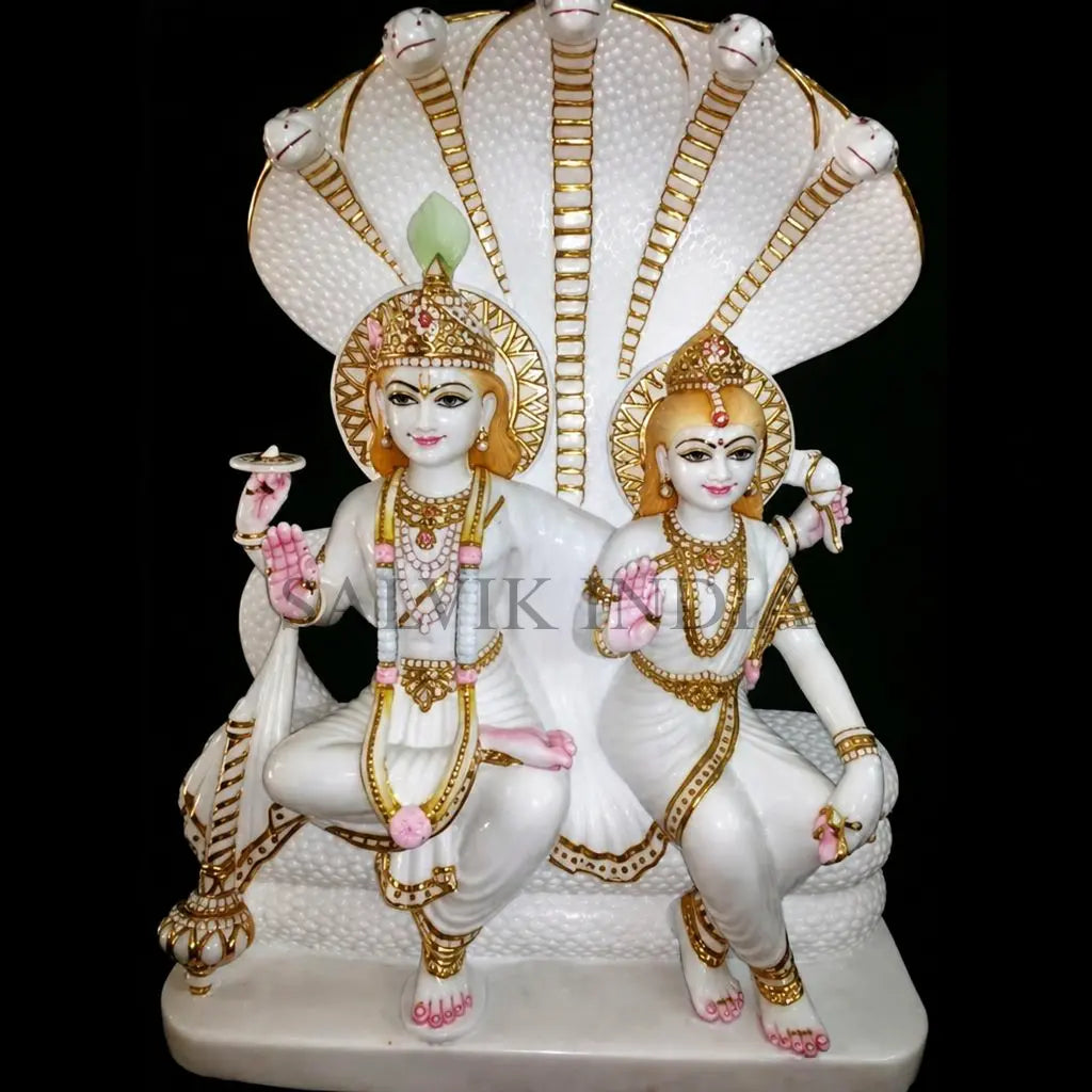 Handcrafted Marble Laxmi Narayan Moorti in white marble with gold-painted details