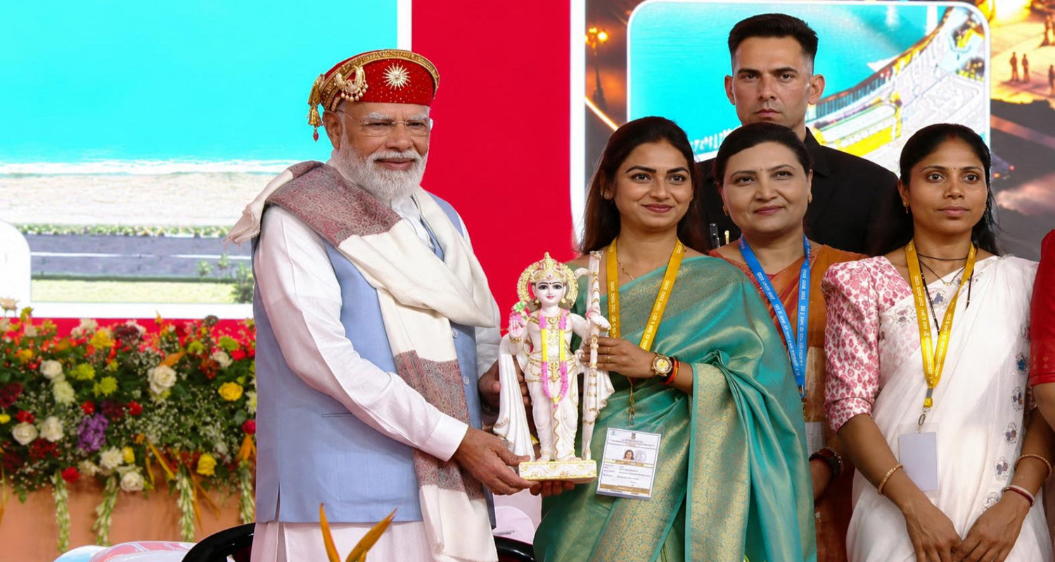 Narendra Modi with a handcrafted marble murti by Salvik India