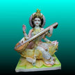 Painted marble Saraswati idol sitting on lotus with Veena artwork