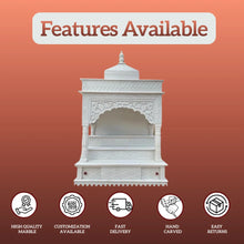 Front view of pillar style marble mandir with carved dome and detailed back panel