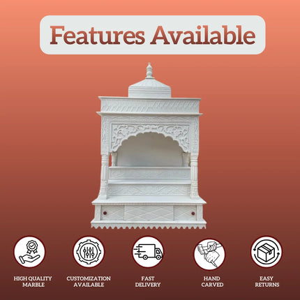 Front view of pillar style marble mandir with carved dome and detailed back panel