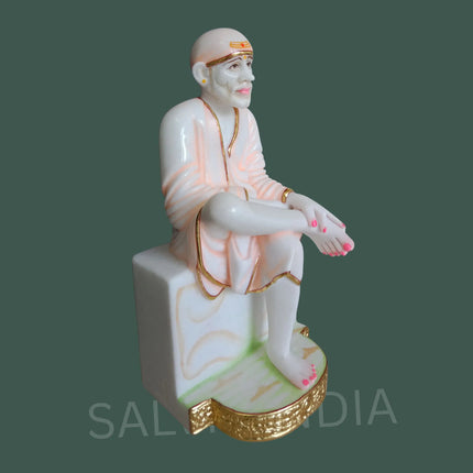 Right side view of big Sai Baba marble murti showing detailed carving
