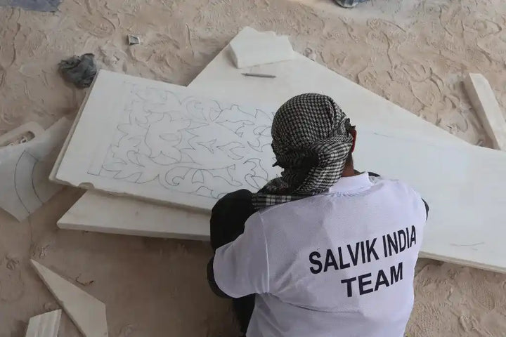 Salvik India artisan hand carving traditional marble design