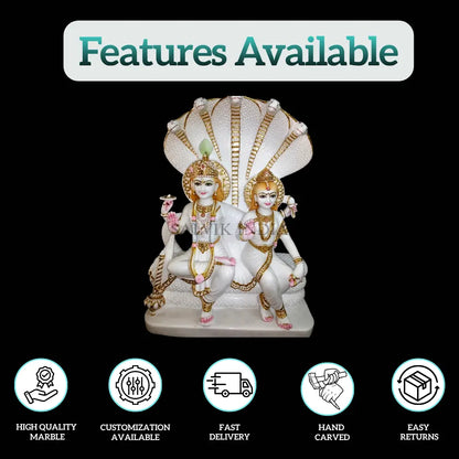 White marble Sheshnaag Vishnu Lakshmi idol with an intricately carved serpent canopy