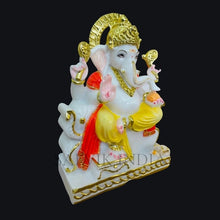 side angle view of Shree Ganesh marble idol with carved detailing