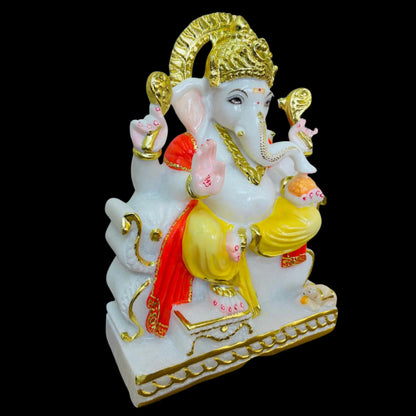 side angle view of Shree Ganesh marble idol with carved detailing