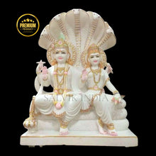 Handcrafted Vishnu Laxmi Murti in white marble with Sheshnag design by Salvik India