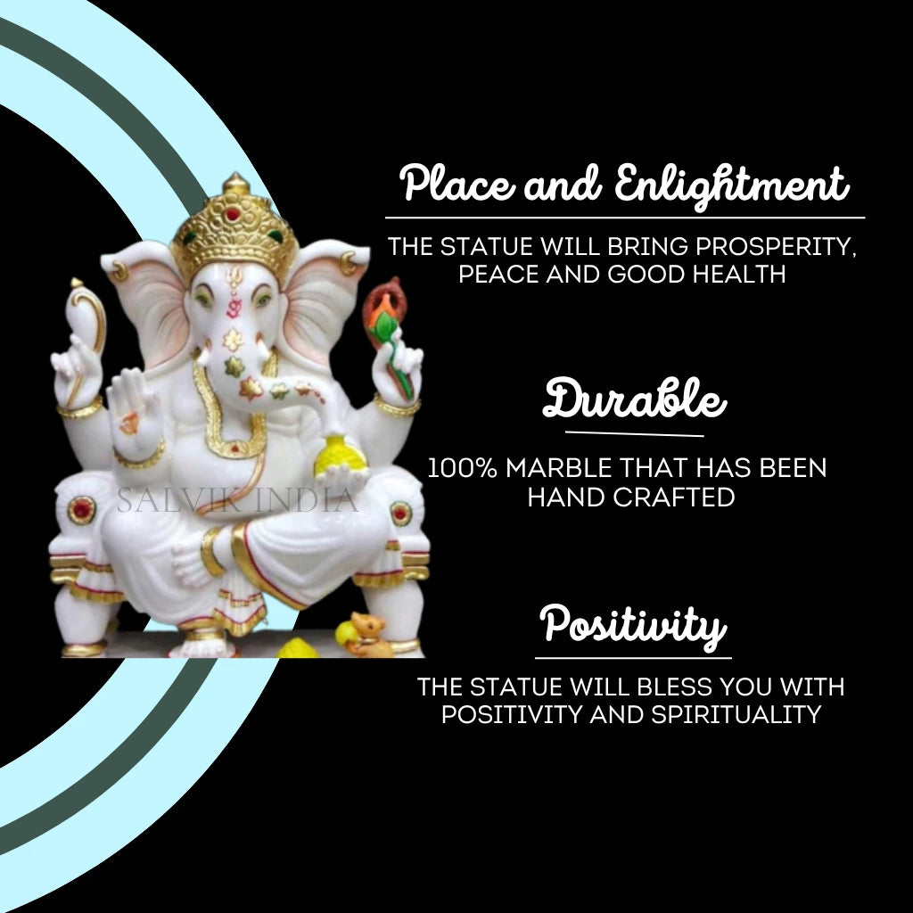 Close-up of White Marble Ganesh Idol with gold detailing