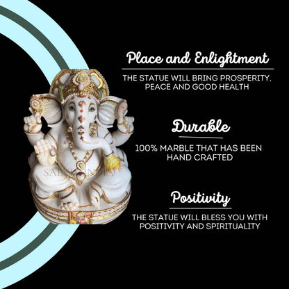Close-up of White Marble Ganesha Statue with gold embellishments