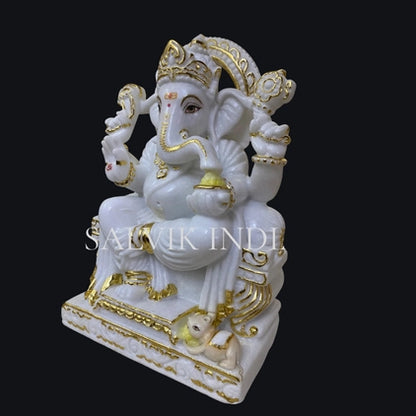 Side view of white marble Ganpati murti