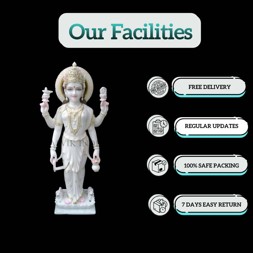 White marble Lakshmi idol seated gracefully on a lotus