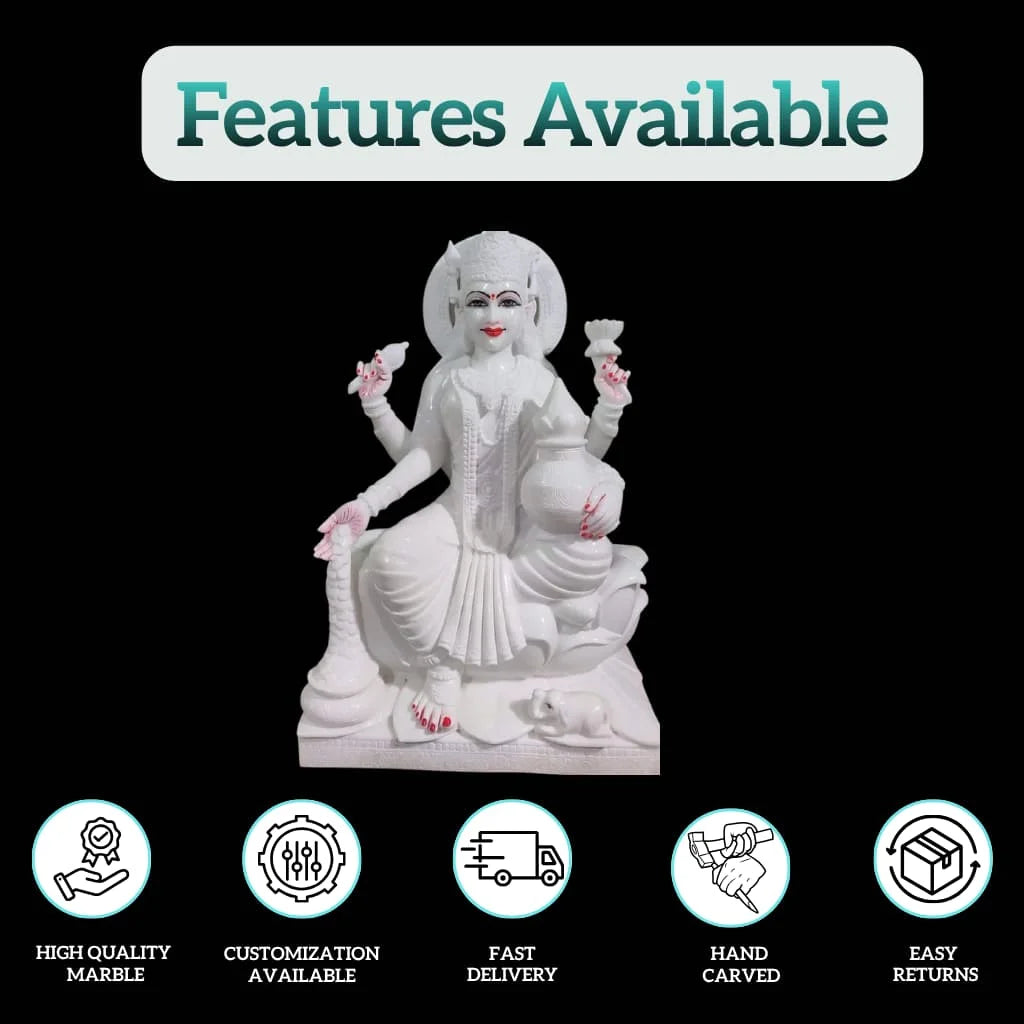 White marble Lakshmi statue with handcrafted detailing
