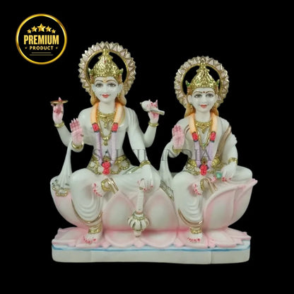 White marble Laxmi Narayan Murti with detailed carving and pastel pink lotus accents